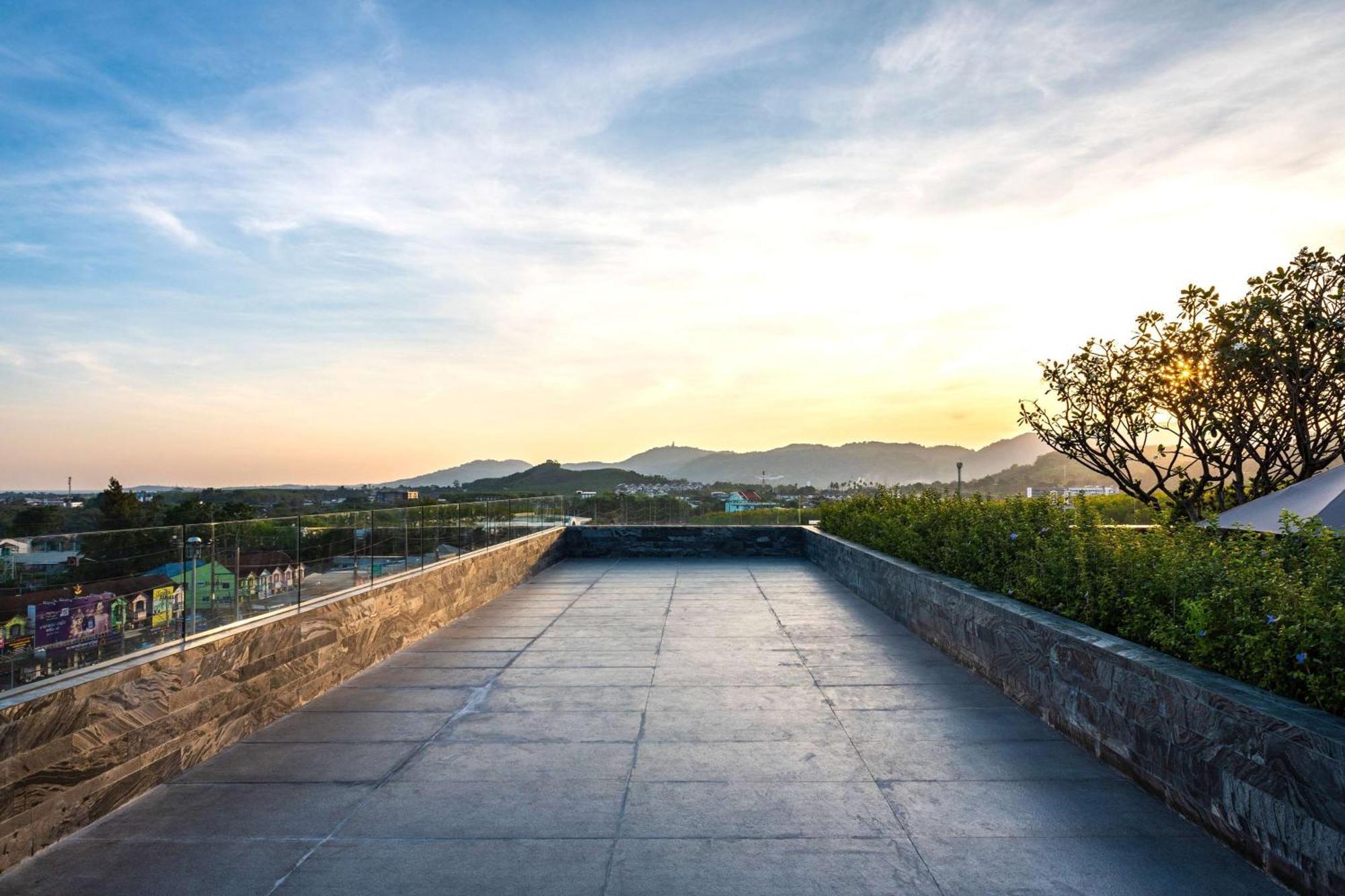 Hotel Ramada Plaza By Wyndham Chao Fah Phuket Exterior foto View of the city from the rooftop of the hotel